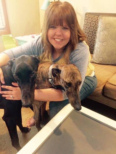 Sara with foster dogs.